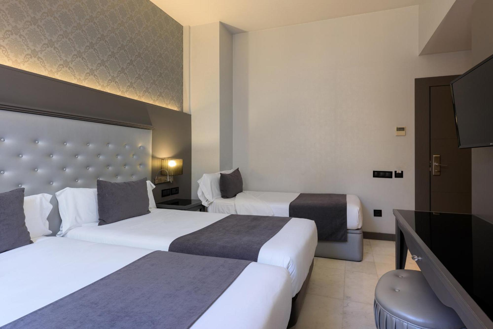 Tweepersoonskamer met 1 of 2 Bedden en een Extra Bed